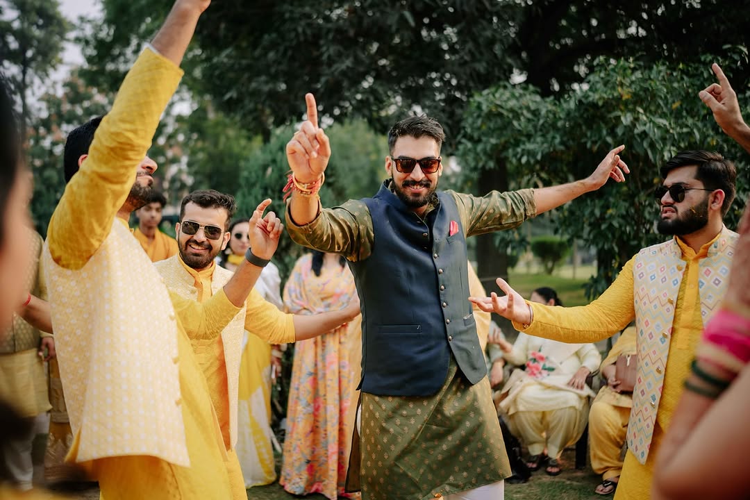 Groom dancing at the baraat